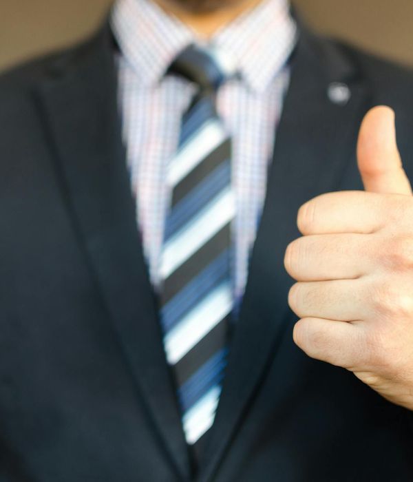 Man executive in modern business suit presenting analytics