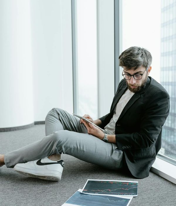 Professional analyzing financial data on modern technology