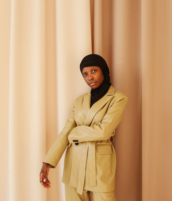 Woman professional in elegant business suit with confident expression