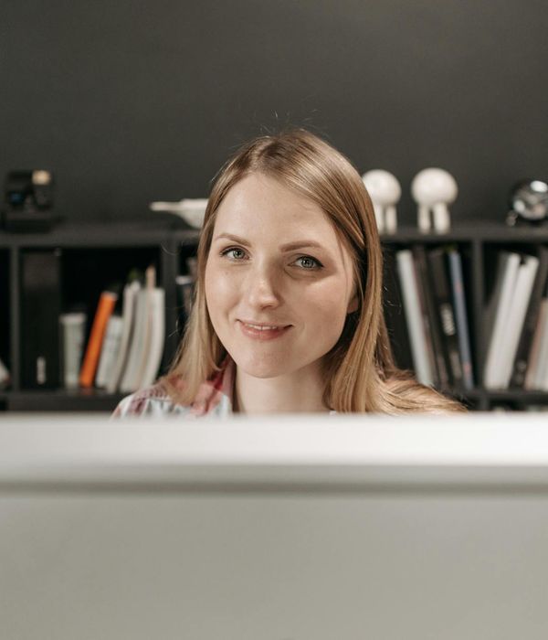 Woman professional organizer with friendly demeanor in office